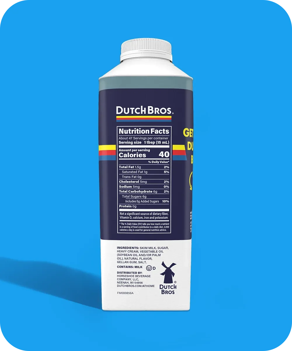 Dutch Bros coffee creamer container showing nutrition facts label on navy blue packaging against bright blue background.
