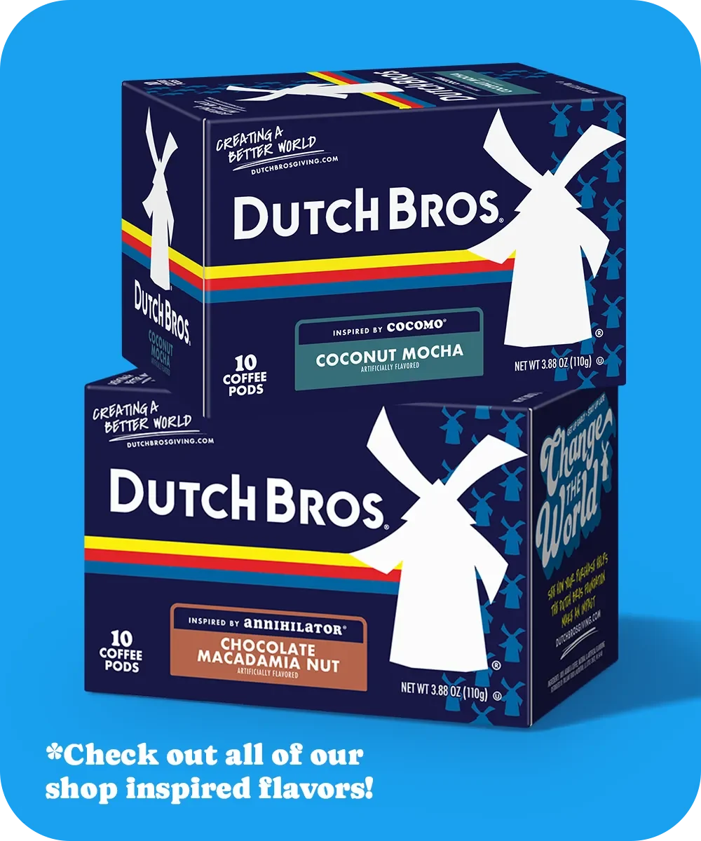 Two Dutch Bros coffee pod boxes against blue background - Coconut Mocha and Chocolate Macadamia Nut flavors.
