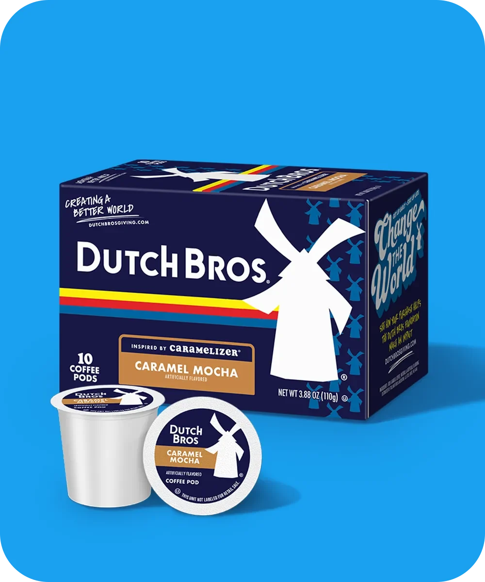 Dutch Bros Caramel Mocha coffee pods box containing 10 single-serve pods, with one pod displayed in front, on blue background.