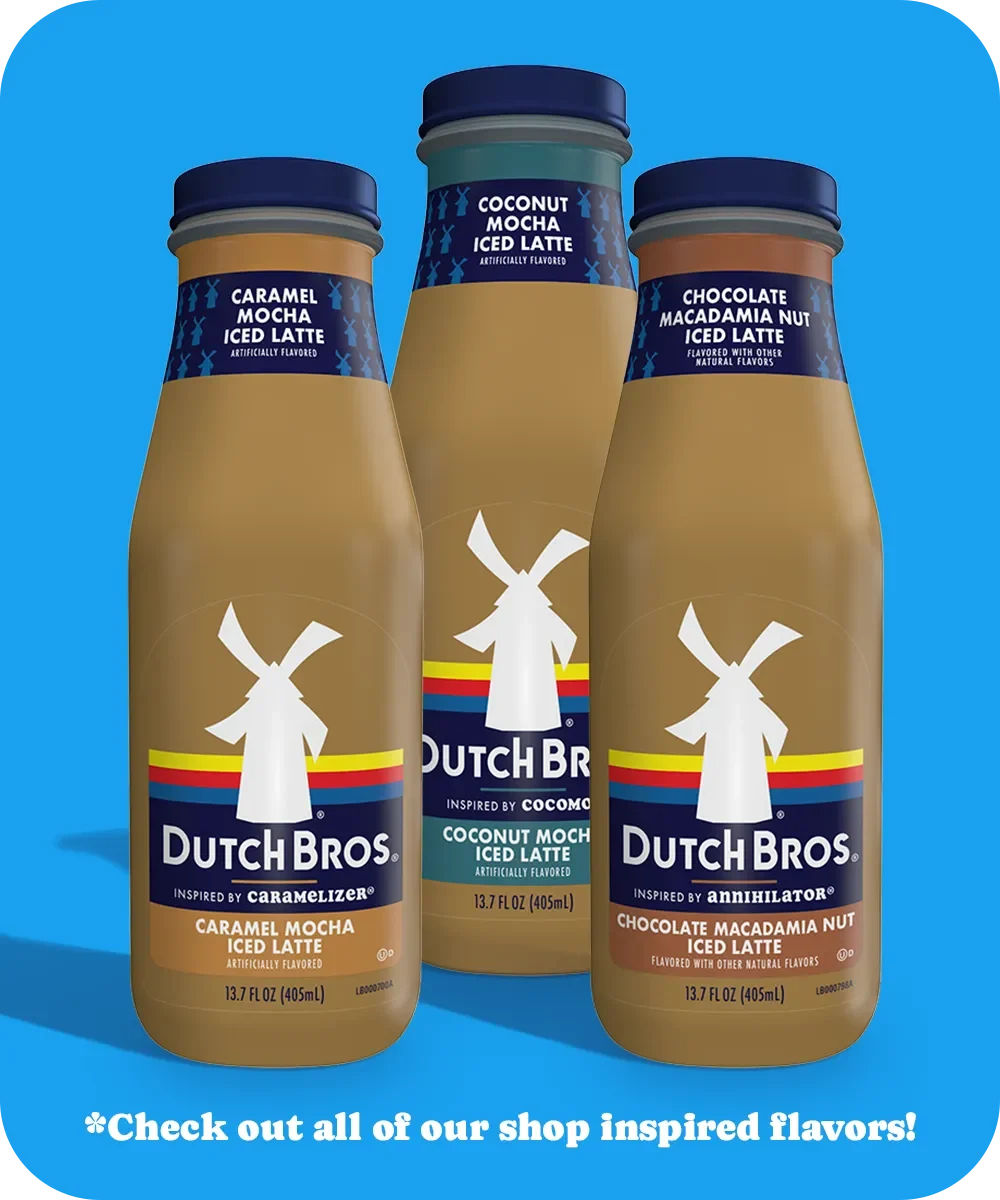 Three Dutch Bros bottled iced lattes in caramel mocha, coconut mocha, and chocolate macadamia nut flavors against blue background.
