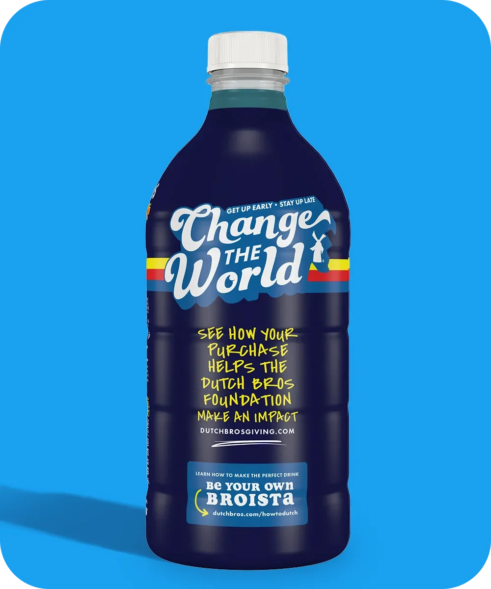 Navy blue Dutch Bros bottle with "Change the World" slogan against bright blue background, promoting foundation impact.
