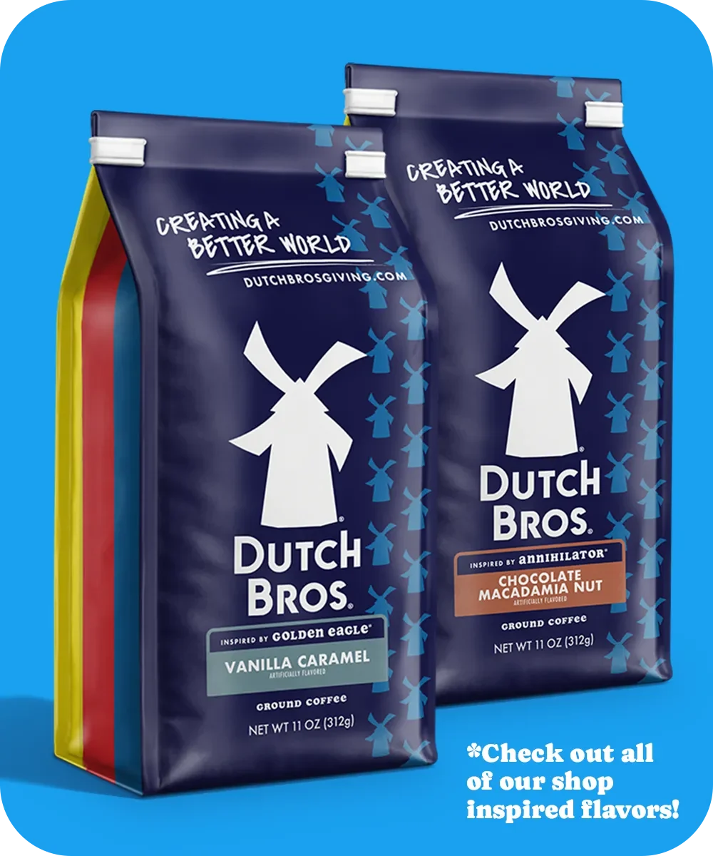 Two Dutch Bros coffee bags featuring Vanilla Caramel and Chocolate Macadamia Nut flavors on a blue background.